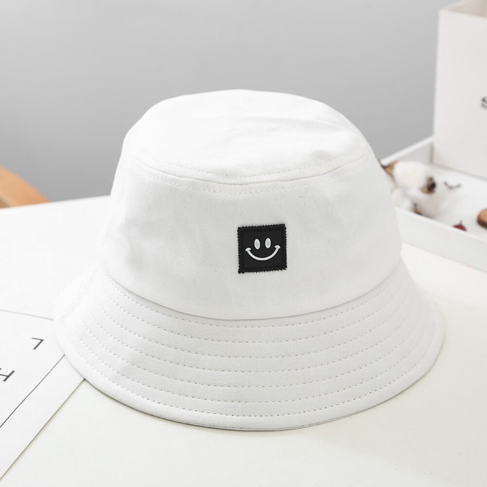 Smiley Face Bucket Hat. Shop Hats on Mounteen. Worldwide shipping available.